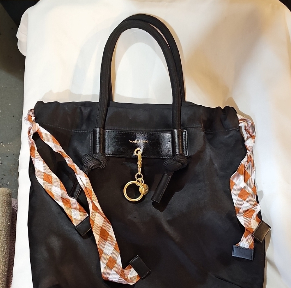Elegant Black Tote Bag with Gold Accents